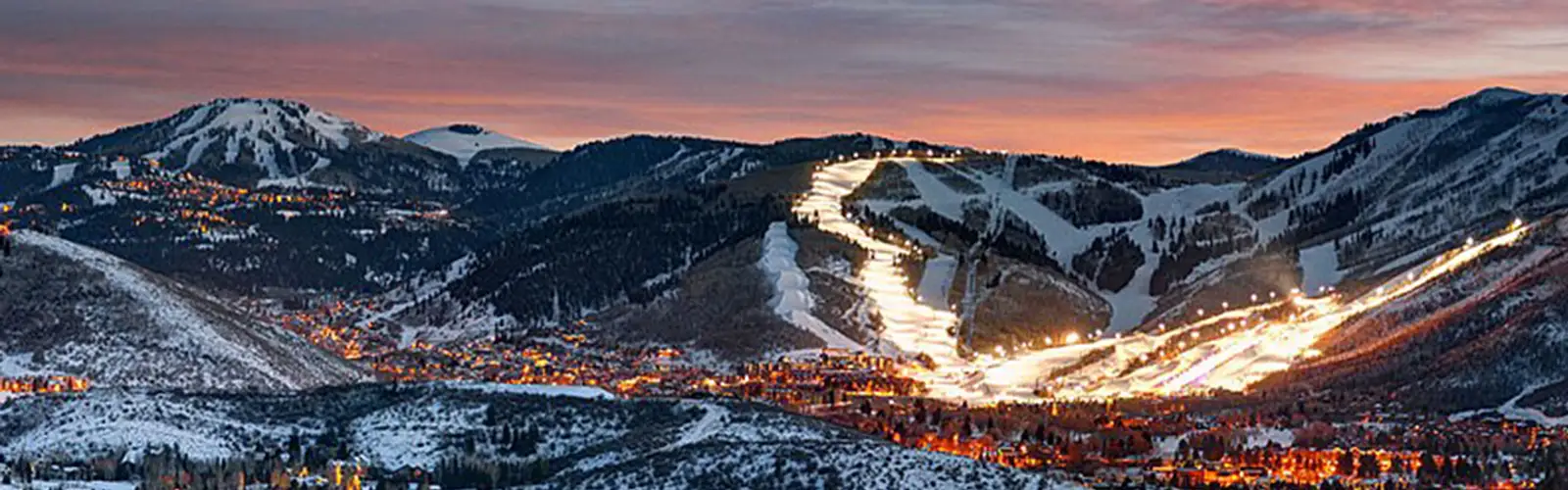 Park City ski runs lit at dusk