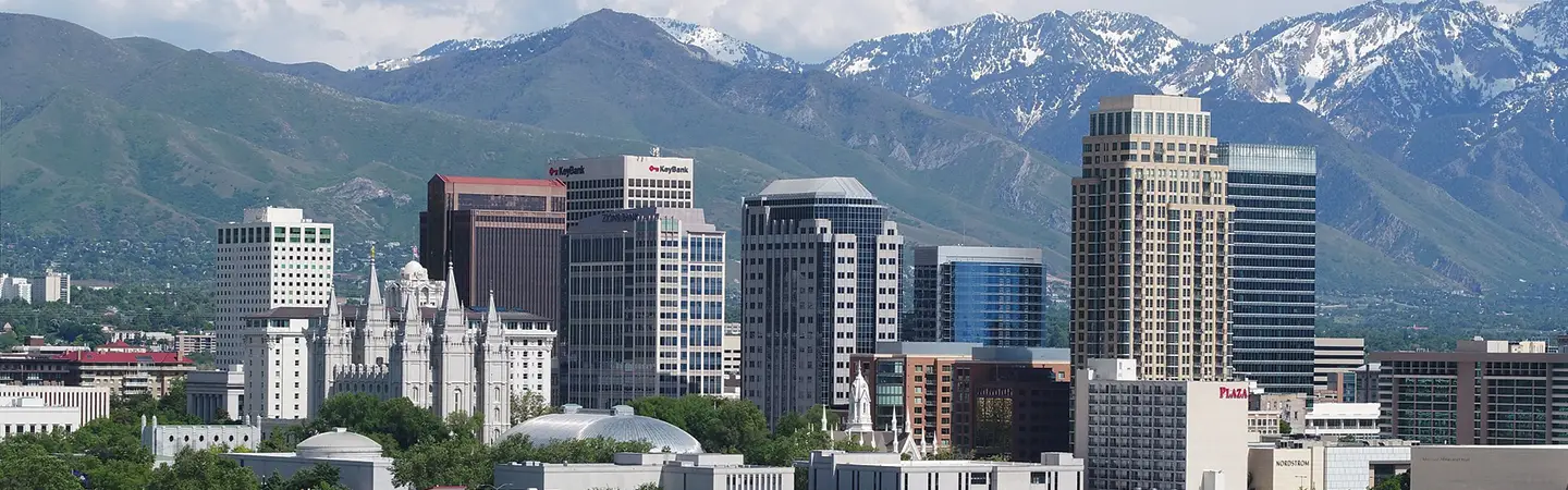 Salt Lake City skyline with the snow-capped Wasatch Range behind it